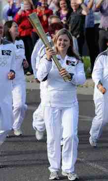 Aimi carries the Olympic Torch in Sheffield