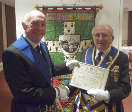 WBro Keith receiving his Diamond Jubilee certificate in 2012