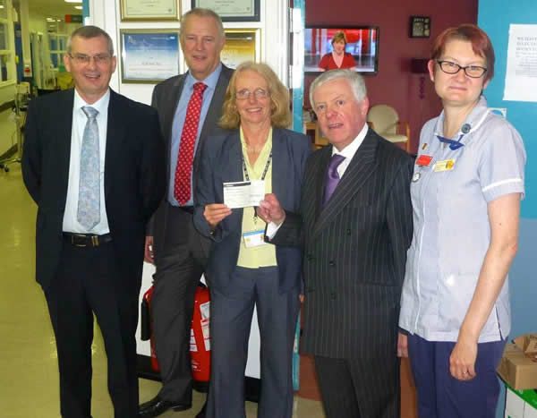 (l to r) WBro Martin Peel (Charity Steward), Bro John Allen (Worshipful Master), Dr Lyndsey Brawn,  WBro Michael Branch, Nurse Mary Daniels