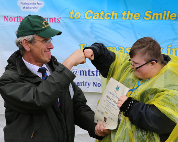 These photographs (by courtesy of WBro Trevor Pywell) show the joy on the faces of two of the recipients of the fishing day certificates when the certificates were presented to them by the Provincial Grand Charity Steward, WBro Gerry Crawford